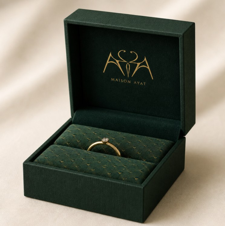 Maison Ayat packaging in green and gold
